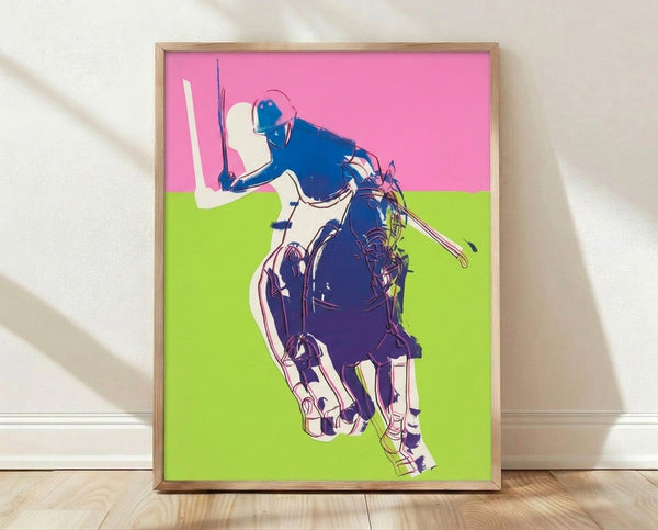 Pop art poster featuring a stylized polo player in vibrant pink against a bold green background, framed on a wall.