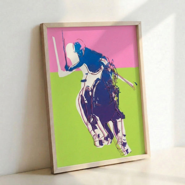 Modern pop art poster displaying an equestrian polo subject in striking pink tones set against vivid green, gallery-framed on wall.
