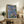 Soft, dreamy water garden scene showcasing floating lilies in cool aquatic tones, impressionist poster art.