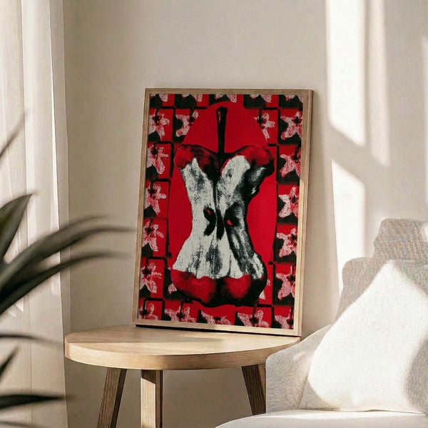 Retro pop art print featuring a vibrant red apple core against stark black and white elements, embodying contemporary graphic design sensibilities.