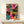 Vibrant abstract pop art print featuring a jazz trio performing with bold geometric shapes and a celebratory color palette of hot pink, teal, and orange.