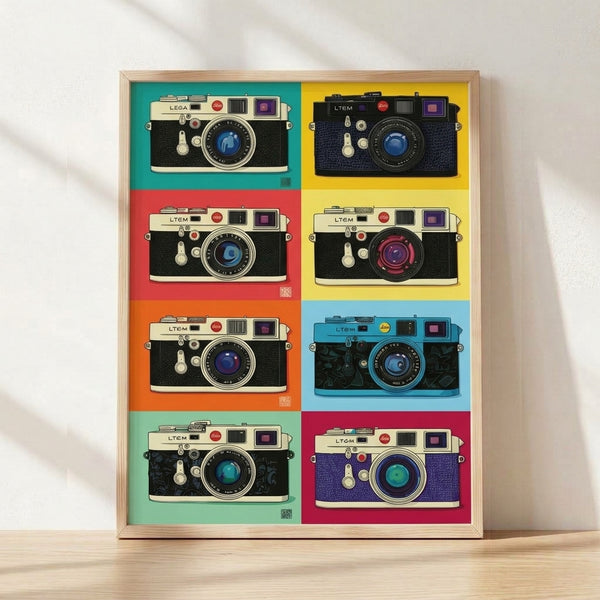 Pop art style poster featuring a Leica rangefinder camera in a vibrant grid layout with teal, yellow, coral, and purple tones on cream background, framed on wall.