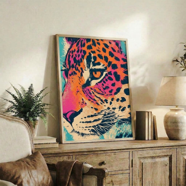 Contemporary retro-style leopard face art print featuring striking jewel tones and high-contrast pop art design in frame.