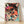 Bold pop art leopard portrait with a vibrant face in coral, magenta, and teal against a cream background, framed on a wall as modern retro wall art.