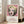 Minimalist pop art portrait in vivid pink and cream tones, capturing the bold, iconic character of contemporary wall art.