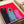 Screaming cats artwork in bold pop art style using magenta, red, blue, and black hues, featuring three felines with expressive open mouths in a retro graphic design.