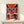 Vibrant contemporary owl art print featuring energetic abstract shapes in coral, red, and navy blue with gold highlights on black background.