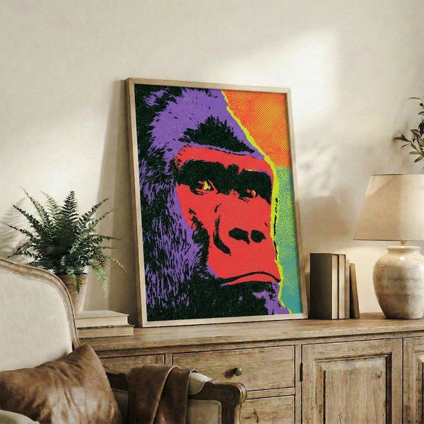 Y2K-style gorilla head print featuring energetic neon colors and high-contrast pop art design in a wall-mounted frame.