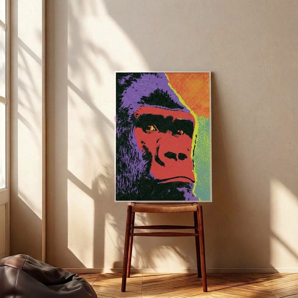 Funky gorilla portrait with bold cyberpunk-inspired colors and pop art aesthetic, shown framed on a wall.