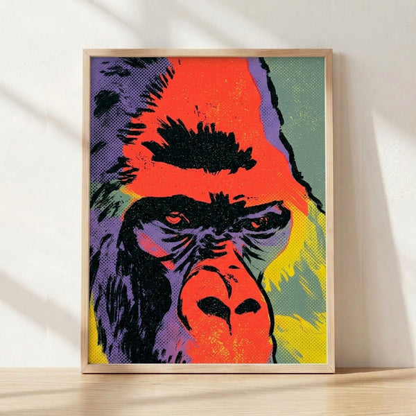 Bold pop art gorilla portrait with vibrant orange, purple, and yellow colors creating an expressive, high-energy composition on a framed wall poster.