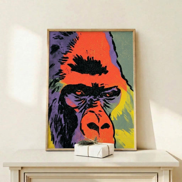 Framed modern pop art print of a gorilla face rendered in striking teal, orange, and black tones with dynamic retro aesthetic appeal.