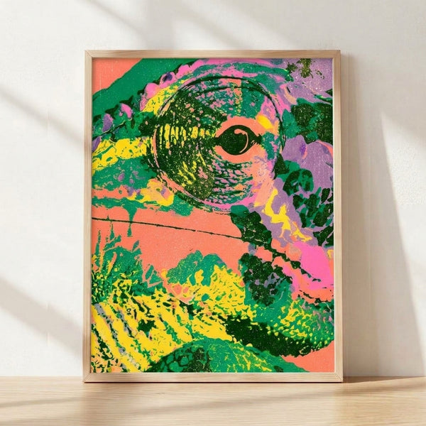 Neon psychedelic pop art poster featuring a reptile eye in vibrant pink, green, and yellow with abstract Y2K design elements.