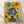 Vibrant pop art poster of a stylized robot wearing a crown and headphones, surrounded by dotted circles and geometric shapes in yellow, black, blue, and red against a white background.