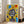 Contemporary pop art print of a crowned robot figure with headphones, surrounded by speaker and turntable symbols in dotted, trippy style using bold yellow, red, and black accents.