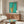 Bold pop art saxophone poster showcasing vibrant turquoise and golden yellow colors with black accents, delivering an upbeat retro-modern statement for music enthusiasts.