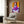 Shadowy religious figure in soft neutrals and deep tones, painted with loose, expressive marks creating an unsettling yet contemplative framed poster.