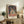 Abstract bust portrait in muted ochre, cream, and rust colors with impressionist expressionism, capturing quiet introspection in a framed wall artwork.