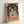 Matisse-inspired faceless portrait artwork in minimalist style with warm color palette, displayed as framed home decor.