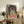 Modern portrait artwork with obscured facial features in soft ochre and neutral tones, framed poster for home gallery.