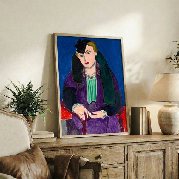 Contemporary wall art depicting an abstracted figure in vivid blue, faceless design with clean lines and peaceful aesthetic.