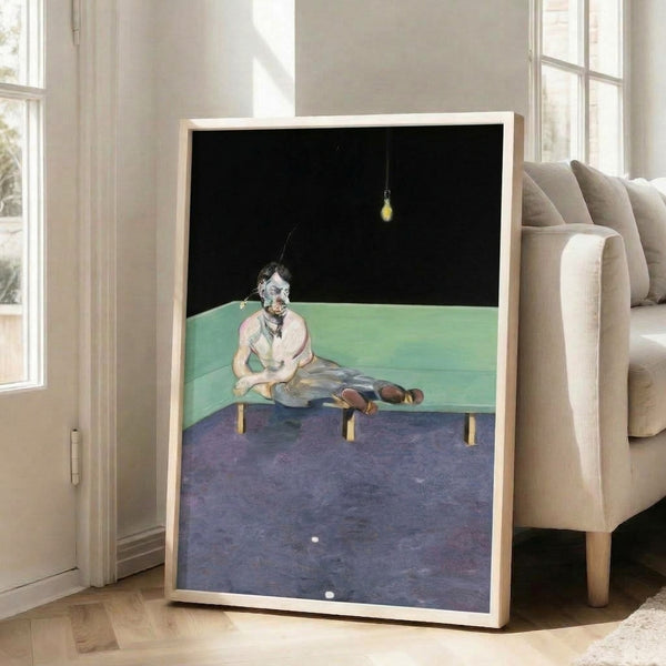 Framed modern art print featuring a shadowy seated figure rendered in bold, distorted strokes with an enigmatic, introspective mood in charcoal and ochre hues.