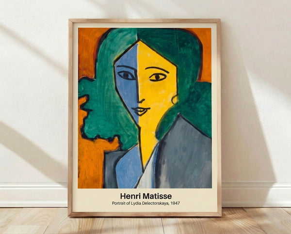 Abstract portrait of a woman in vibrant yellow, blue, and green tones, rendered in Matisse's minimalist style with bold organic shapes and a contemplative mood.
