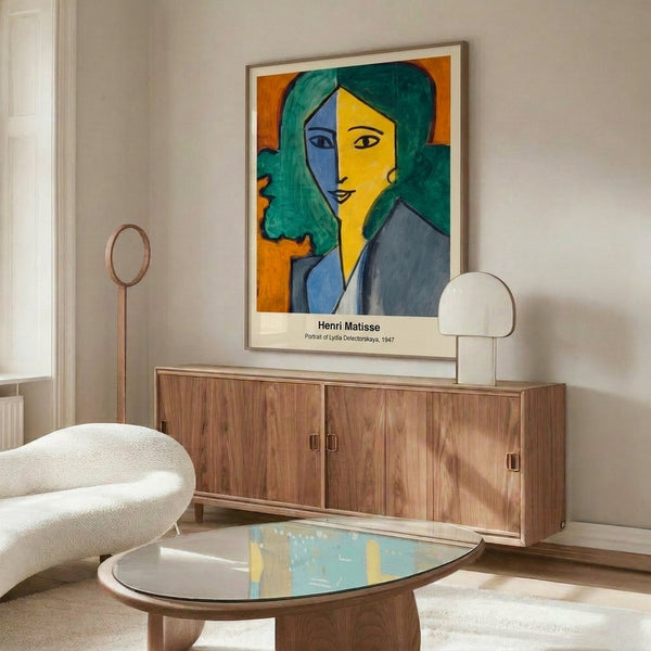 Framed poetic portrait of a woman rendered with abstract forms and a striking palette of yellow, blue, and green suggesting quiet introspection.
