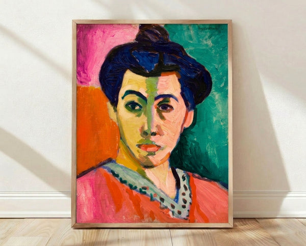 Matisse portrait featuring a woman's face with bold green stripe down the center, rendered in soft watercolor tones of pink, ochre, and cream against a muted background.