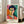 Contemporary framed poster art showing a minimalist woman's portrait with bold color blocking in red, green, blue, and white.