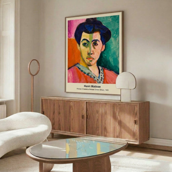 Wall-mounted art print depicting a woman's portrait through fluid, colorful abstraction with dominant greens, reds, and blues.