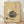 Minimalist Japanese woodblock-style poster featuring a steaming hotpot with ladle in warm cream and charcoal tones, evoking nostalgic wabi sabi aesthetics.