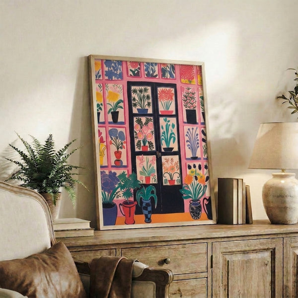 Wabi sabi aesthetic poster featuring a domestic window scene of potted plants and greenery rendered in retro colors: pink, yellow, teal, and cream with graphic black lines.
