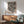 Contemporary abstract poster blending Bauhaus design with minimalist line work in black, red, and cream tones, creating visually intense and reflective wall art.