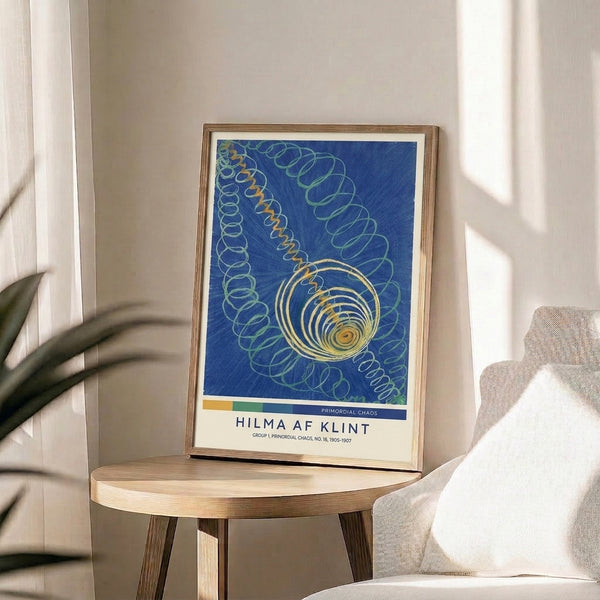 Minimalist abstract art print featuring layered geometric circles and spiral motifs in golden yellow, blue, and pale green, creating a cosmic and meditative visual experience on display.
