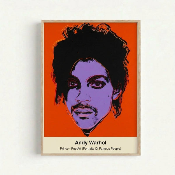 Bright Warhol-style celebrity portrait featuring Prince's face in contrasting neon colors and graphic black lines, displayed as a framed poster.