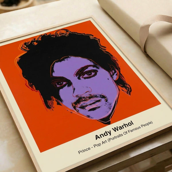 Warhol-inspired pop art portrait showcasing Prince's face in bright neon colors and high-contrast graphic style, displayed as a framed modern art print.