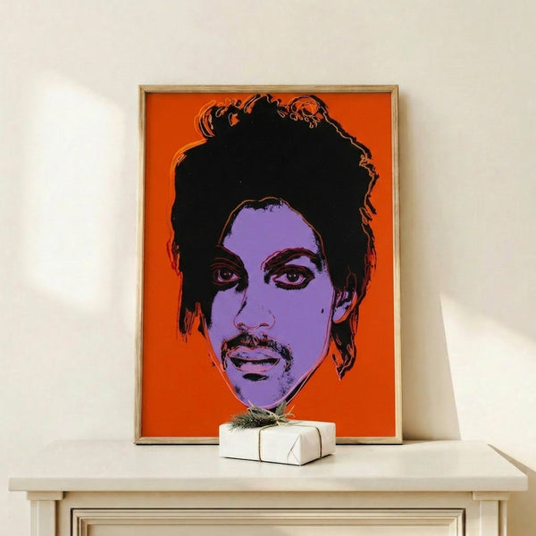 Neon-hued portrait painting of Prince in pop art style with striking color blocking and bold outlines, framed as a modern art print.