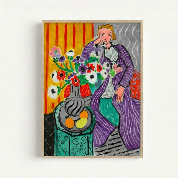 Framed art print displaying a woman in purple robes with loose, gestural brushstrokes and clusters of colorful anemones in a modern abstract composition.