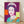 Pop art portrait of Queen Elizabeth II in vibrant jewel tones and gold accents, rendered in the bold graphic style of 1980s contemporary art.