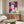 Pop art queen portrait featuring Elizabeth II in saturated colors and graphic design elements, framed as a striking modern wall art piece.