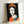 Framed contemporary art print of Queen Elizabeth II rendered in bold pop art aesthetic with deep jewel tones and iconic imagery from the Reigning Queens collection.