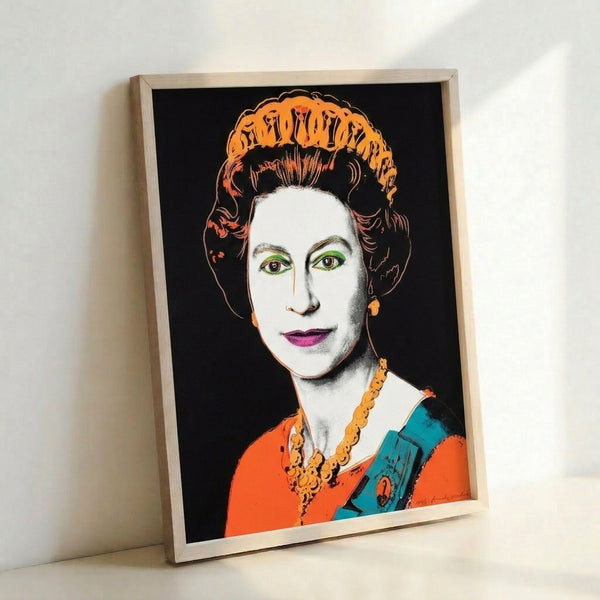 Framed contemporary art print of Queen Elizabeth II rendered in bold pop art aesthetic with deep jewel tones and iconic imagery from the Reigning Queens collection.