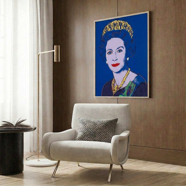 Striking blue pop art work featuring a stylized royal portrait with bold contours and vibrant hues, presented as a framed modern art print celebrating the Reigning Queens concept.