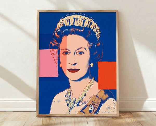 Pop art portrait of Queen Elizabeth II in vibrant blue tones, featuring bold graphic styling and minimal facial detail characteristic of Warhol's Reigning Queens series, framed as a modern art print on a gallery wall.