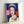 Bold pop art interpretation of Queen Elizabeth II rendered in vivid blues and grays, showing the iconic subject in simplified, graphic form typical of Warhol's contemporary masterpiece approach.