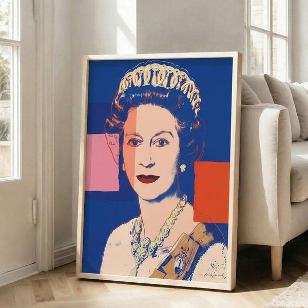 Modern art print showcasing Queen Elizabeth II as a pop art subject with cool blue hues and graphic portrait technique, displayed framed on an interior wall.