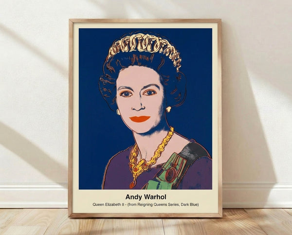 Pop art portrait of Queen Elizabeth II in dark blue and white tones, framed on a wall as a modern minimalist print with iconic regal appeal.