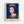 Framed contemporary pop art poster featuring a stylized royal portrait in deep blue, white, and gold accents with minimalist design sensibility.