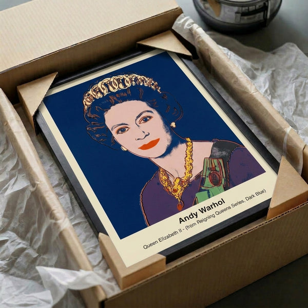 Dark blue pop art framed print with white and gold accents, presenting a bold, iconic portrait in contemporary minimalist style on a wall.