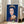 Andy Warhol-inspired portrait of Queen Elizabeth II in saturated dark blue and complementary hues, bold pop art aesthetic from the Reigning Queens series.